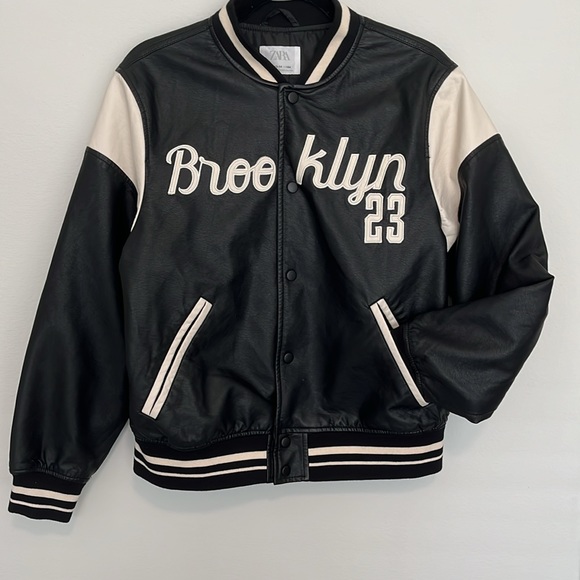 Zara jersey jacket, in a black and tan color. The size is a 13-14 (size small). - Picture 2 of 7